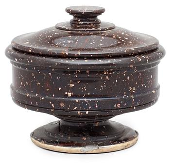 646. A Swedish Empire 19th century porphyry jar with cover.