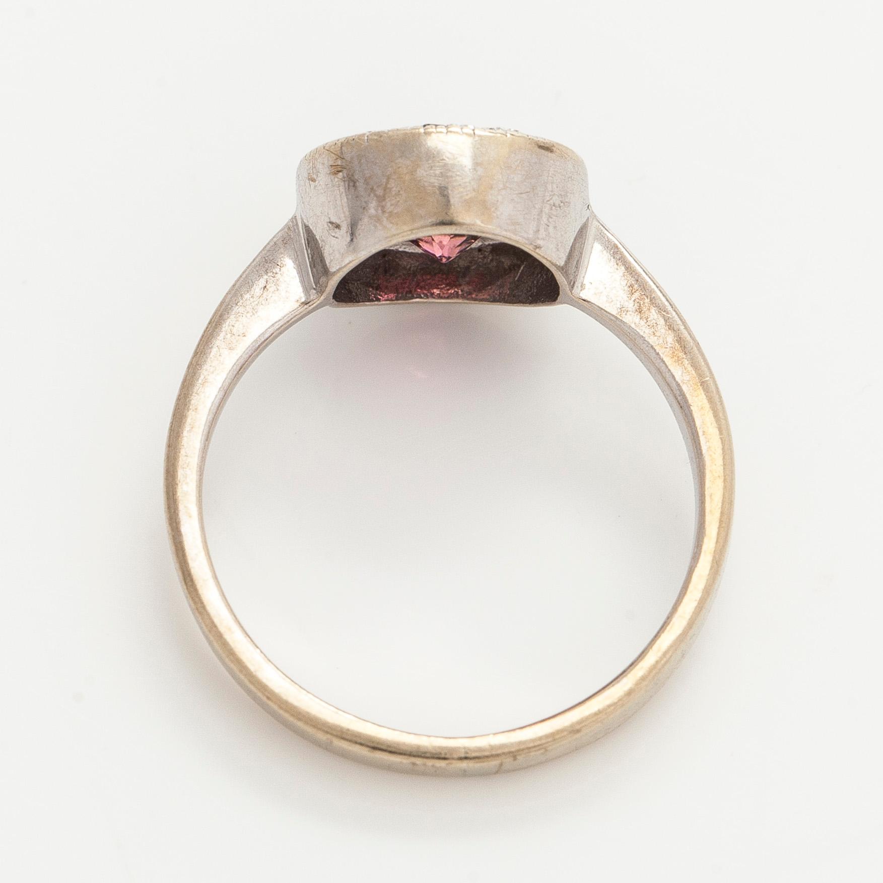 Ring, faceted cut tourmaline, brilliant cut diamonds, 14K white gold.