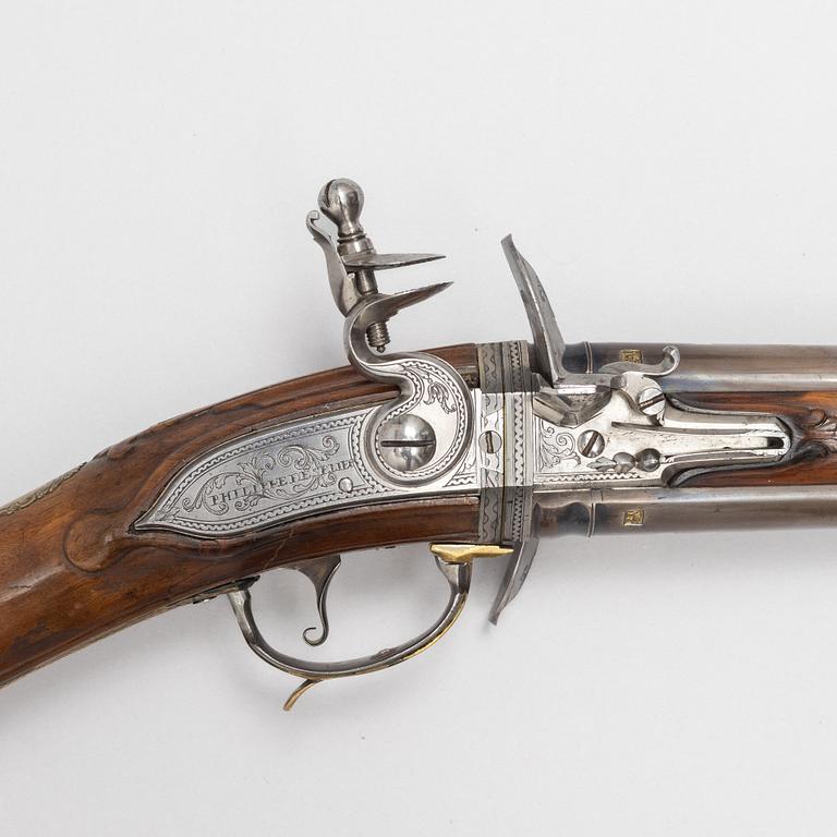 Flintlock rifle, double-barrel "wender" by Philippe de Sellier (1676-1740).