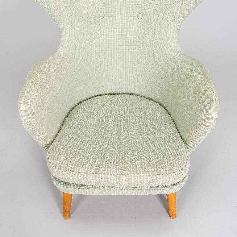 Carl Gustaf Hiort af Ornäs, A mid-20th-century armchair 'Siesta' manufacturer Puunveisto Oy - Träsnideri Ab, Finland.