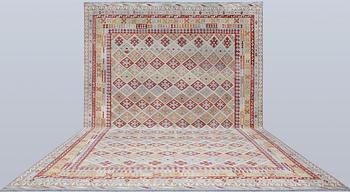 A Kilim carpet, approx. 591 x 401 cm.