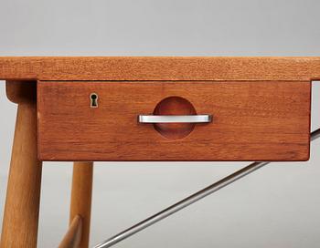 Hans J. Wegner, skrivbord, teak och ek med stålstag, "JH 571", Johannes Hansen, Danmark 1950-60-tal.