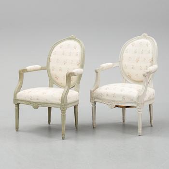 Two armchairs, gustavian and gustavian style, late 18th and early 20th century.