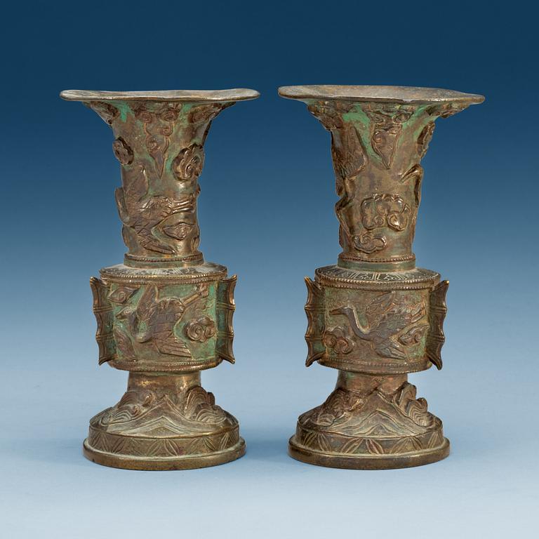 A pair of archaistic bronze vases, Ming dynasty (1368-1644).