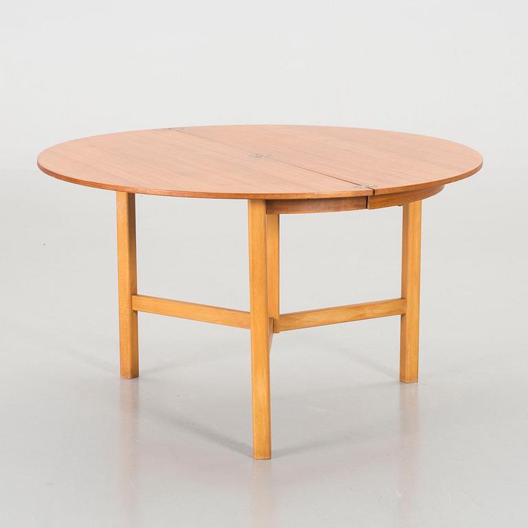 A mid century teak table.