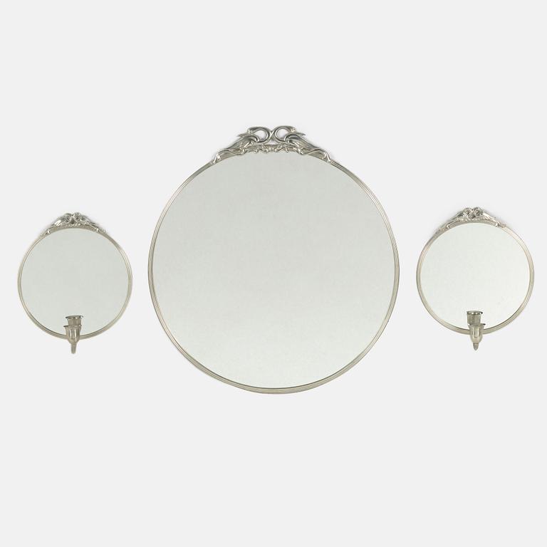 A pewter mirror and a pair of mirror sconces,  second quarter of the 20th century.