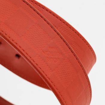 Louis Vuitton, a red Damier Infini 'Detroit' belt, size 100, 2013.