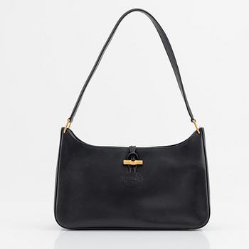 Longchamp, a leather bag.