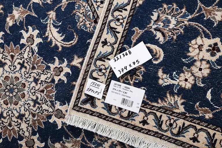 A runner carpet, Nain, part silk, ca 374 x 75 cm.