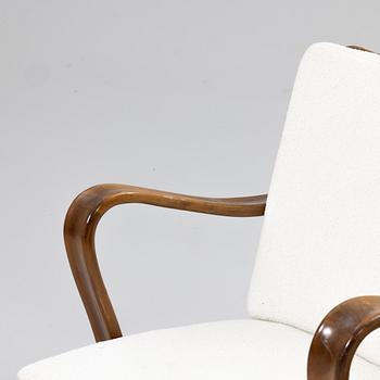 Armchairs, a pair, 1940s/50s.