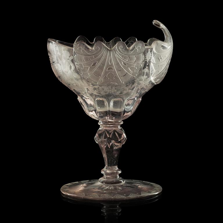 A cut and engraved armorial sweet meat glass, 18th Century.