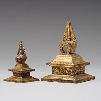 Two Tibetan gilt copper alloy stupa's, 19th Century.