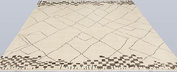 A Moroccan carpet, approx. 303 x 202 cm.