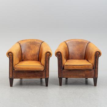 A pair of easy chairs, late 20th century.