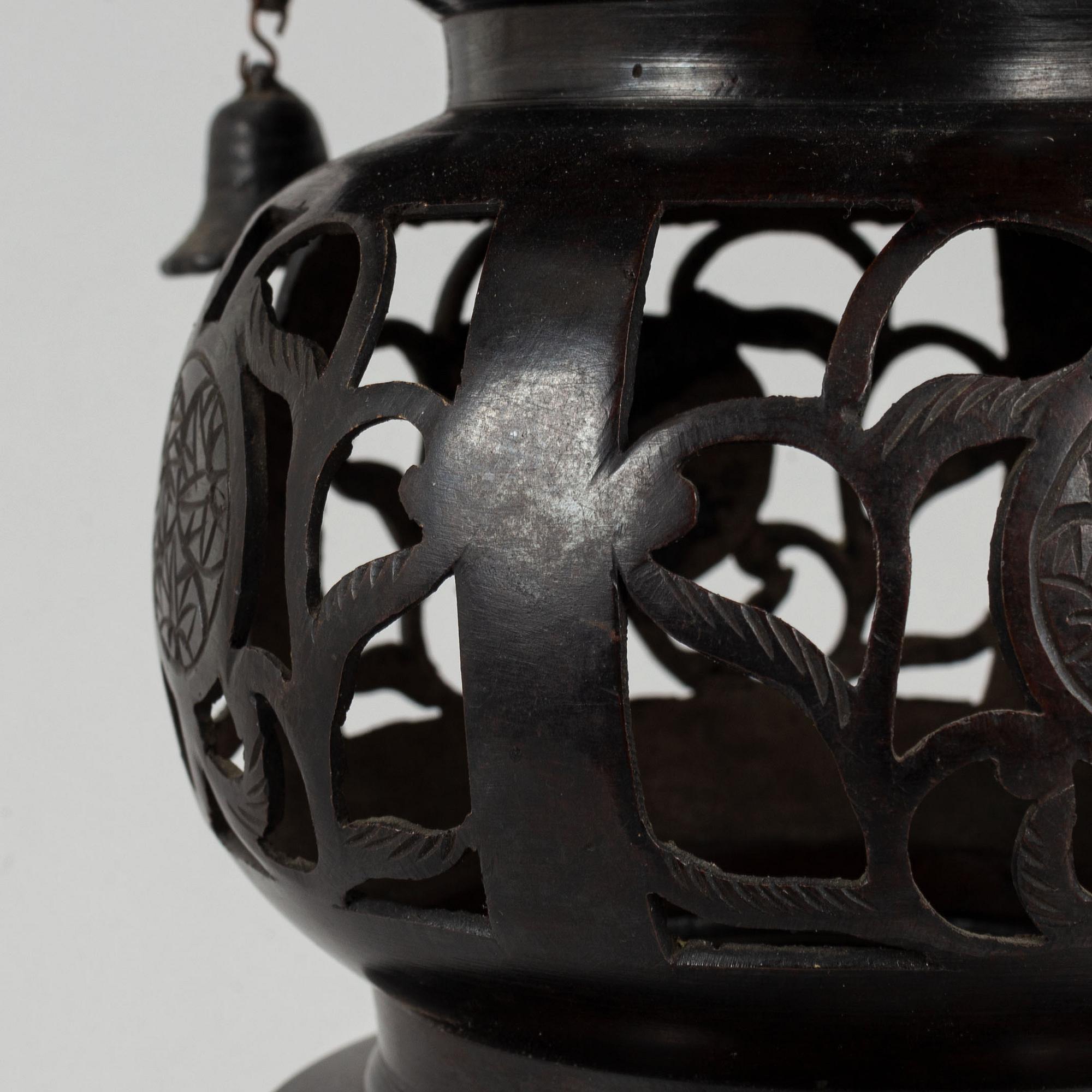 A 20th century Japanese bronze light holder pagoda.