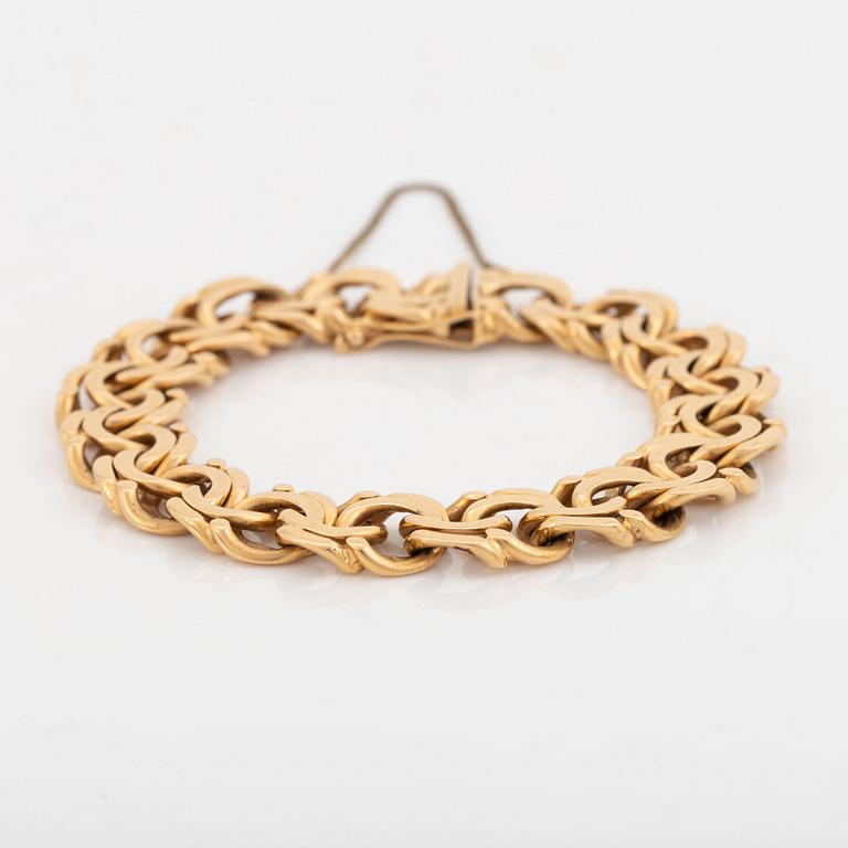 18K gold bracelet.