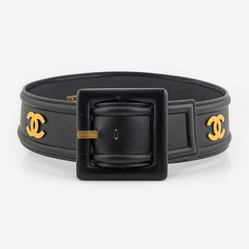 Chanel, a black leather and gold tone metal belt.