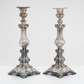 A pair of Neo Rococo silver candlesticks, maker's mark of Roland Mellin, Helsinki 1858.