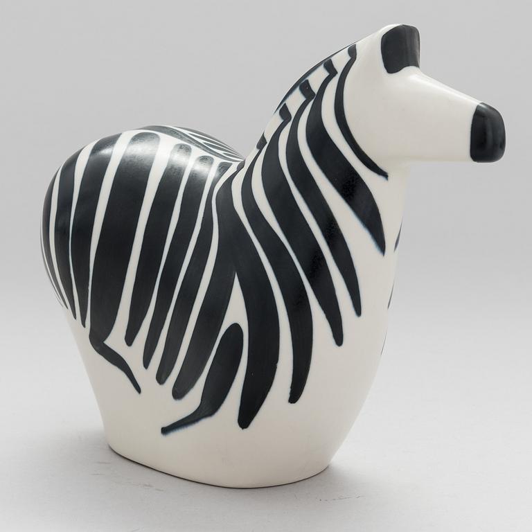 A STONEWARE FIGURINE by LILLEMOR MANNERHEIM, signed Lillemor Arabia -85.