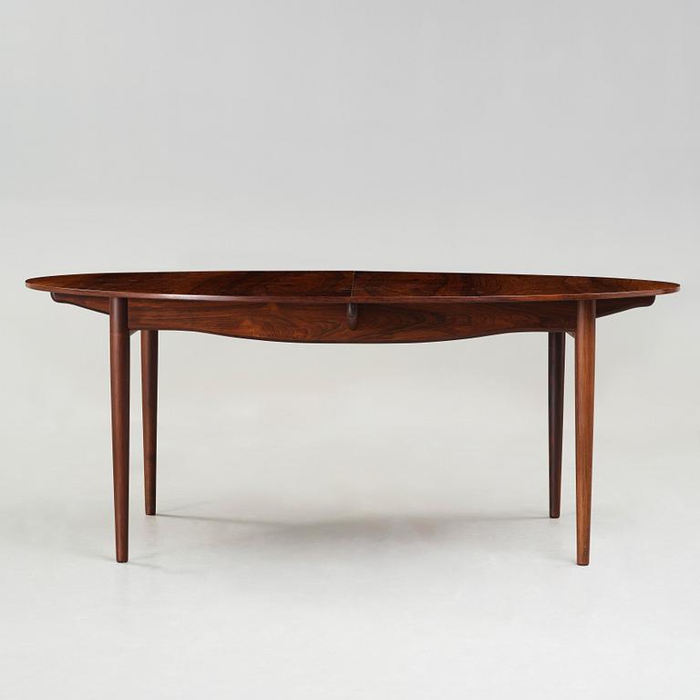 Finn Juhl, A Finn Juhl rosewood 'Judas' dining table, executed by Niels Vodder, Denmark 1960's.