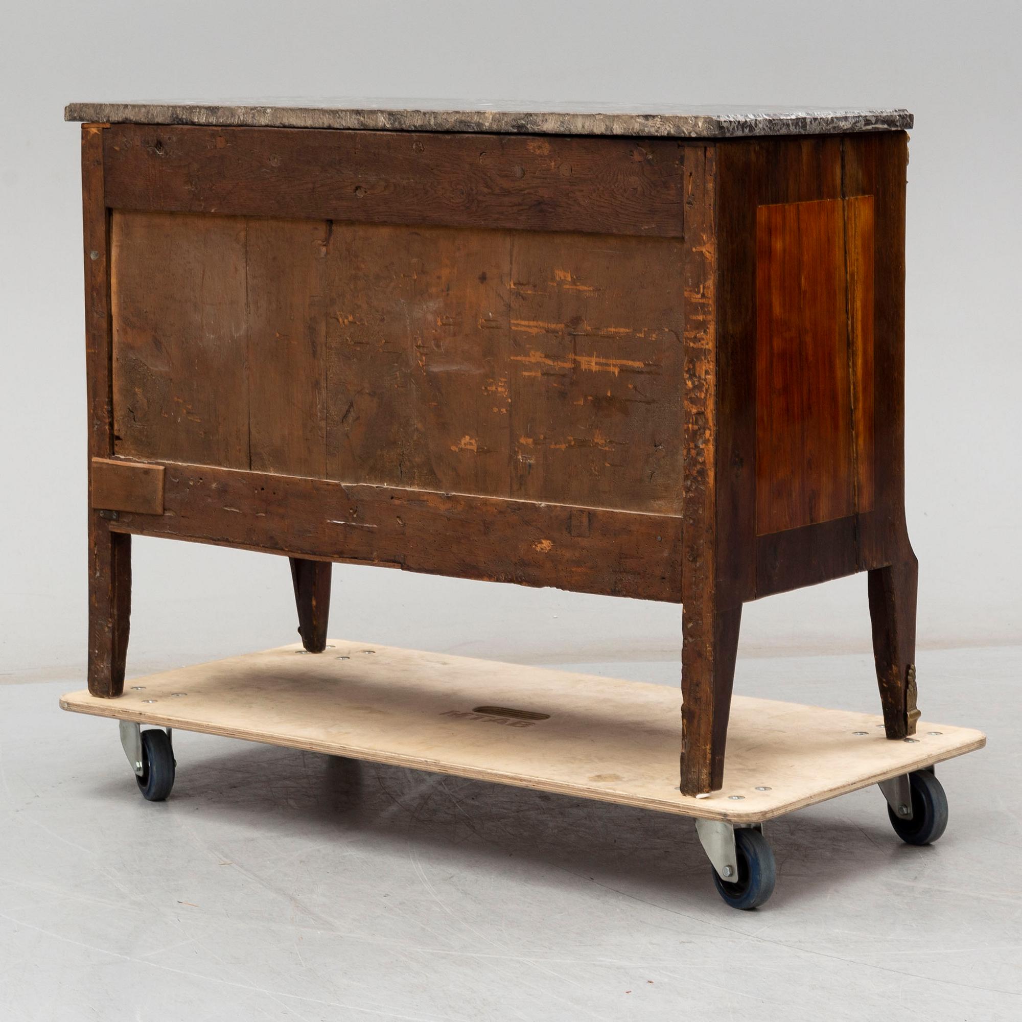 A late 18th century Louis XVI chest of drawers.