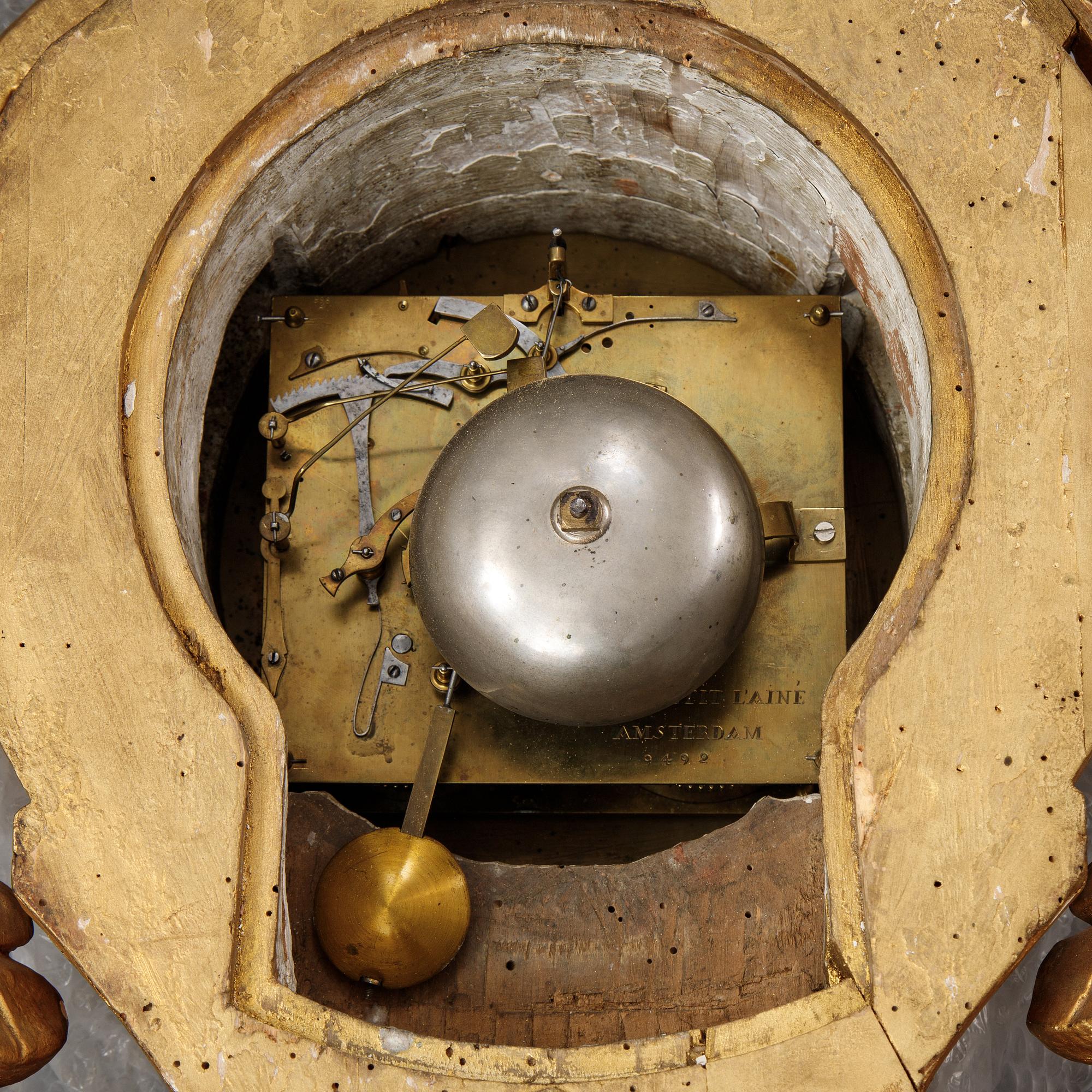 An 18th century Louis XV wall clock Jean-Petit L´Aine, Amsterdam.