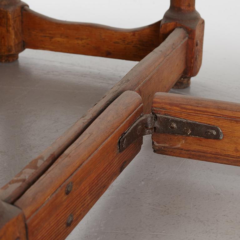 A drop-leaf table, 18th Century.