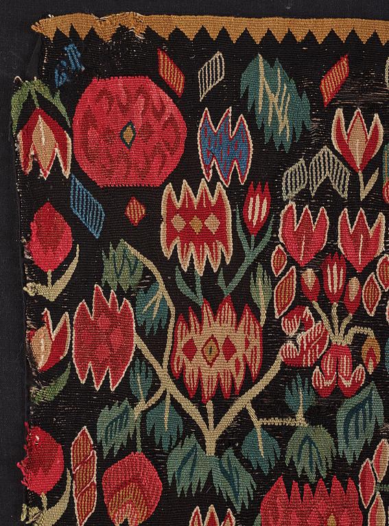 A carrige cushion fragment, 'Blomstermosaik', tapesty weave, c 61 x 48 cm, Scania, around the year 1800.