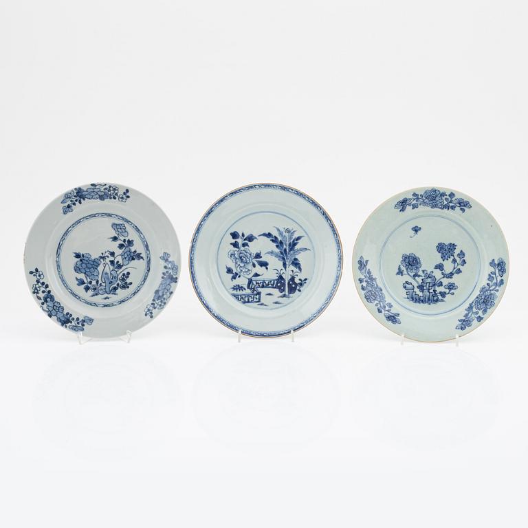 A blue and white serving dish and eight odd plates, Qing dynasty, 18th Century.