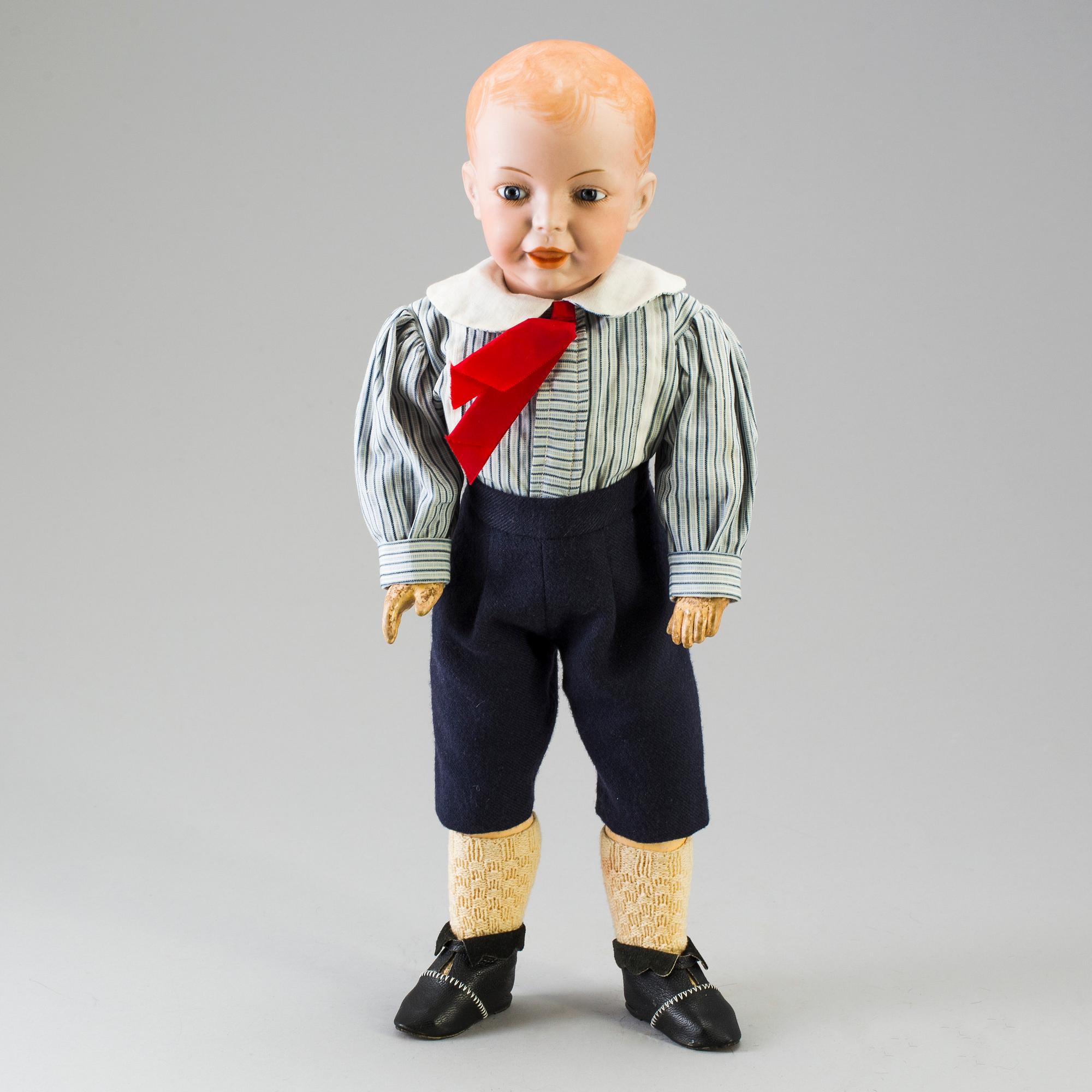 A bisque head character doll marked 226, probably France, 1910s.