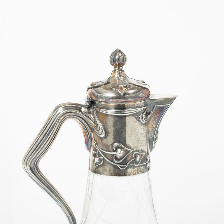 A silver and glass Art Nouveau claret jug, David Andersen, Stockholm, 1901.