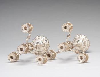 A pair of French 20th century silver 950/1000 four light candelabra, marked Mon Odiot.