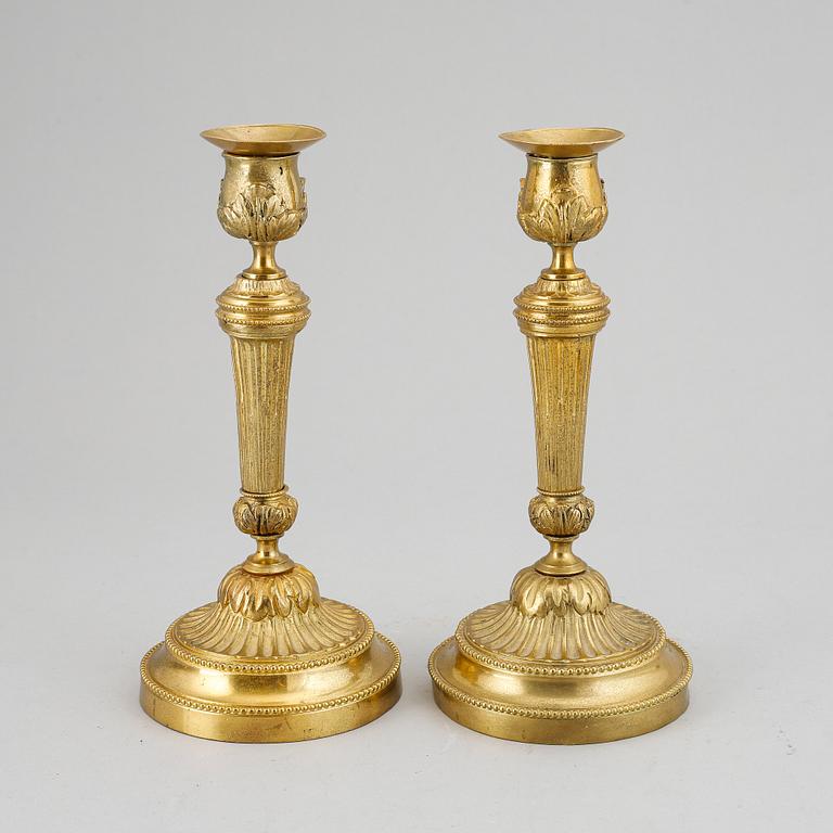 A pair of Louis XVI-style candlesticks, ca 1900.