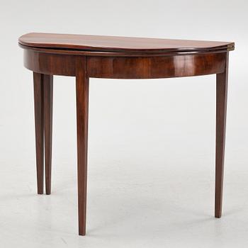 A late Gustavian mahogany veneered games table, around 1800.