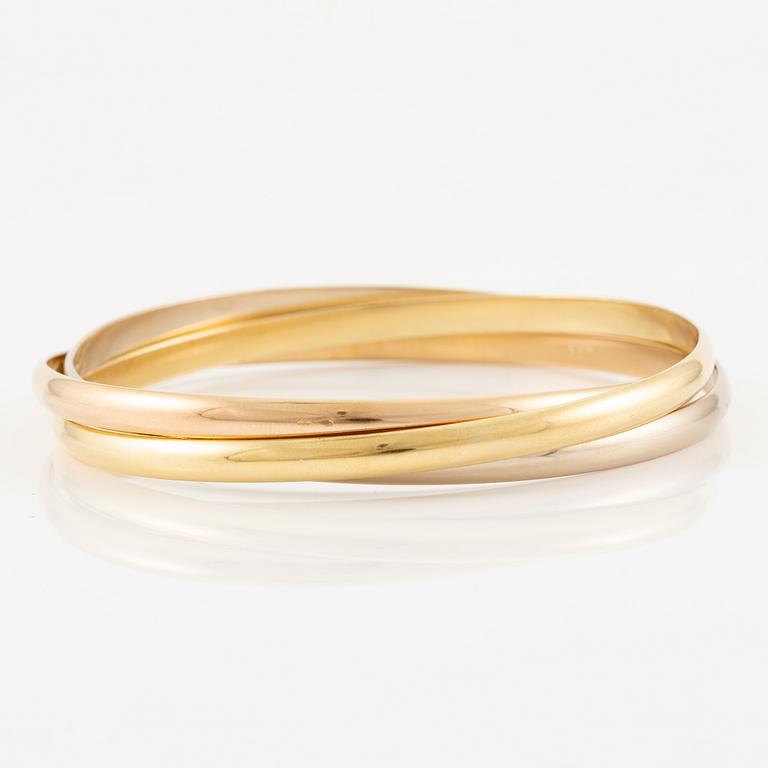 A Cartier bracelet "Trinity" 18K gold in three colours.