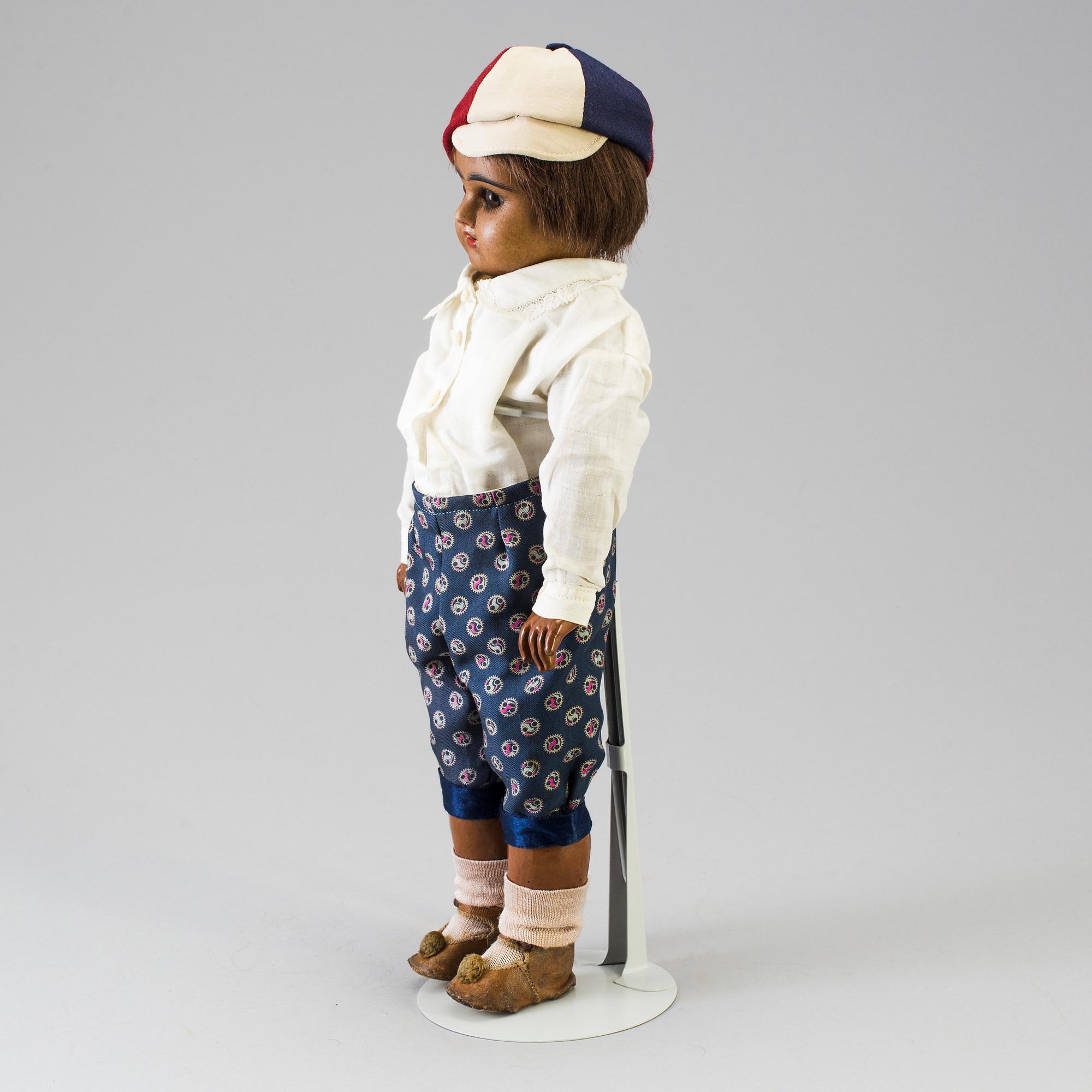 A bisque head doll marked E.D depoussé, France, early 20th century.