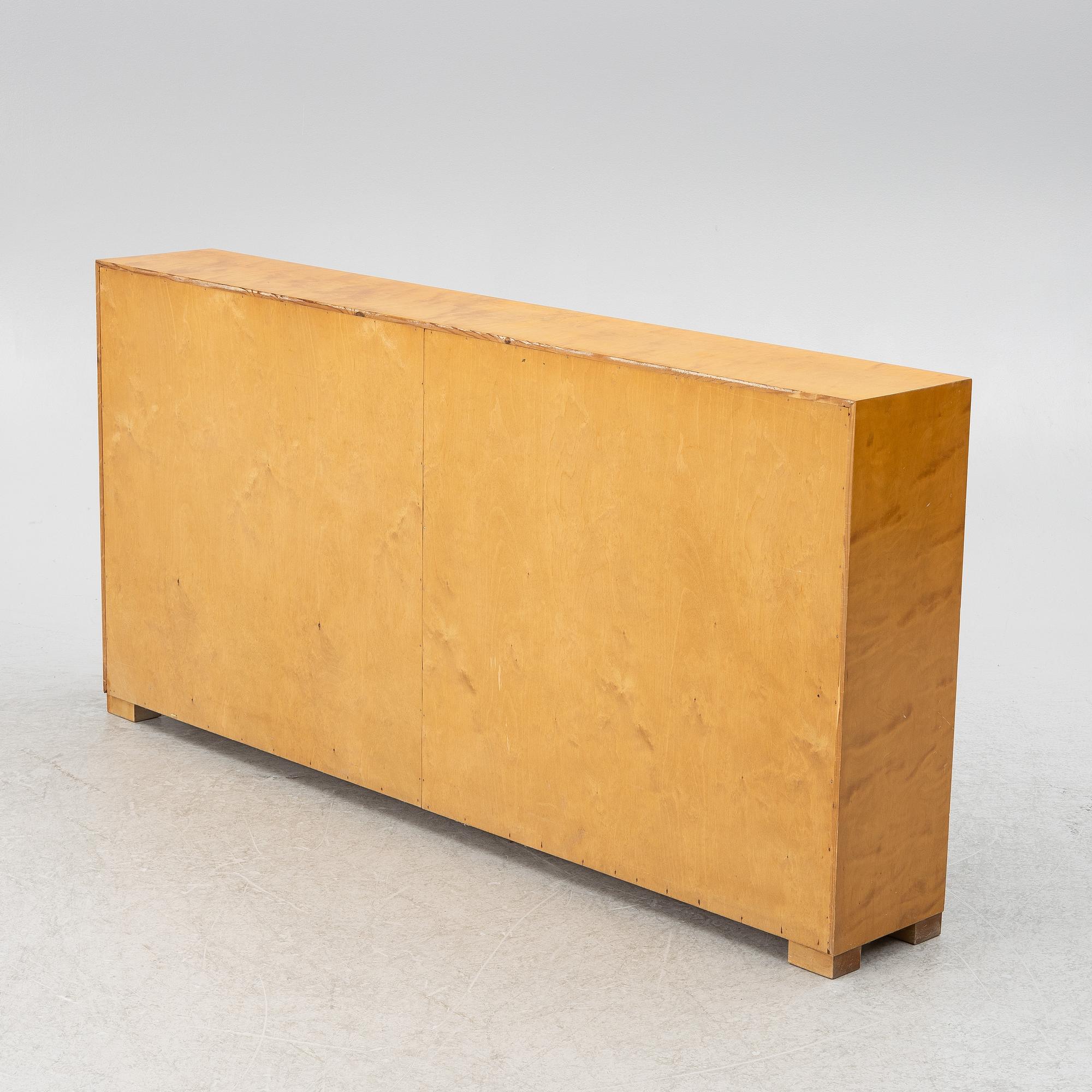 Bokhylla, 1900-talets första hälft.