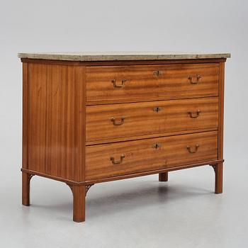 A mahogany-veneered late Gustavian commode by G. Iversson (master in Stockholm 1778-1813).