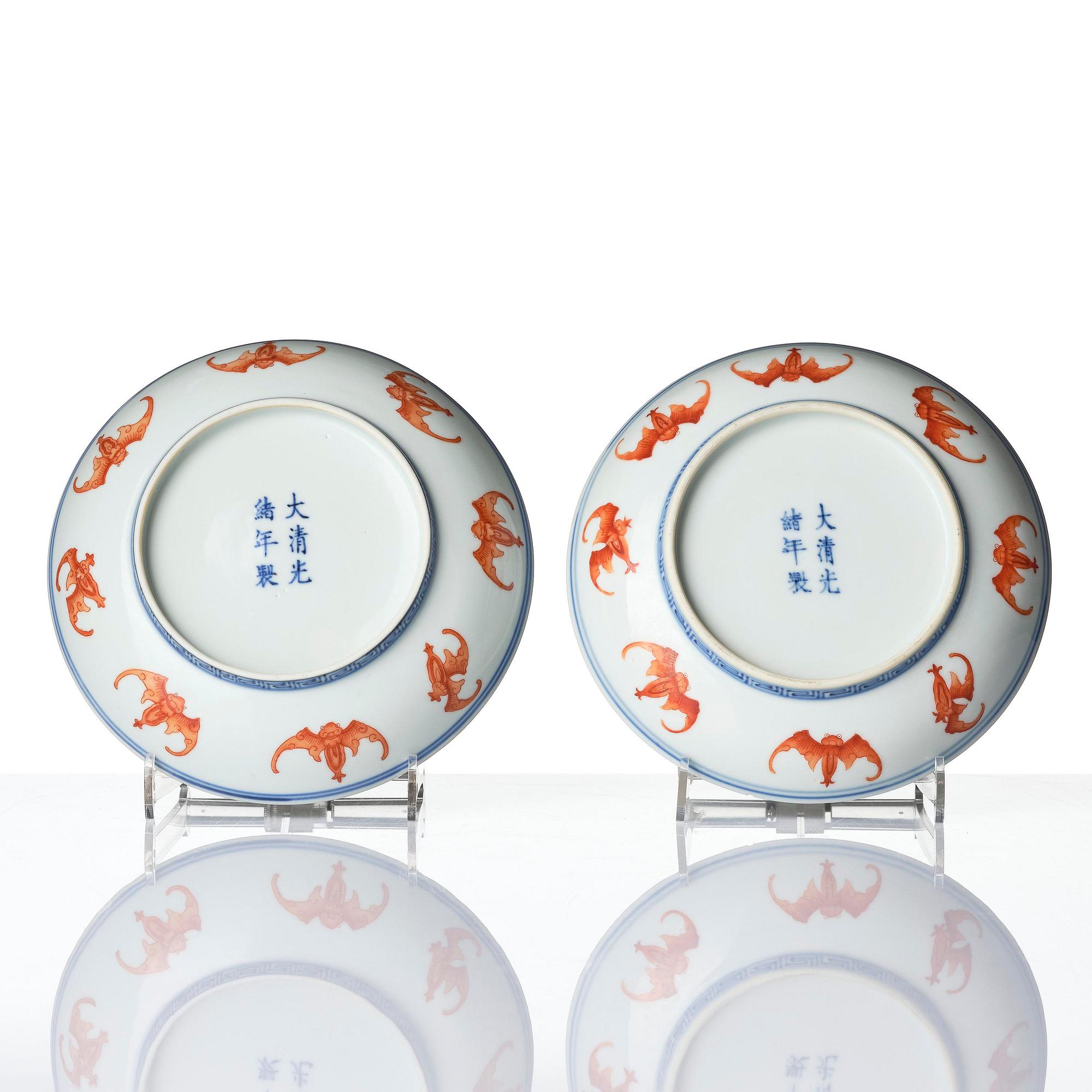 A pair of iron-red decorated 'bats' dishes, Qing dynasty, Guangxu mark and period (1875-1908).