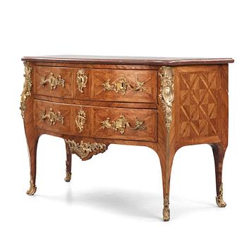 A Louis XV kingwood parquetry and ormolu-mounted commode in the manner of Jacques-Philippe Carel (Paris, 1723-1760).