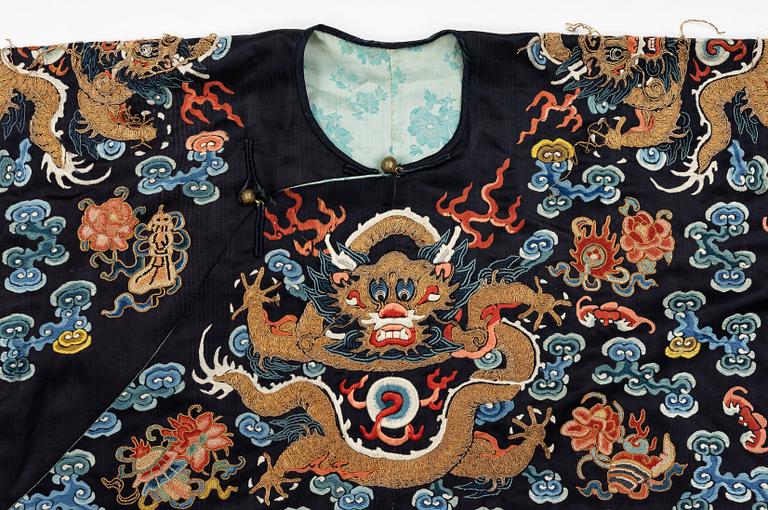 A midnight blue silk 'Chao Pao'/ceremonial robe, Qing dynasty, 1850's.