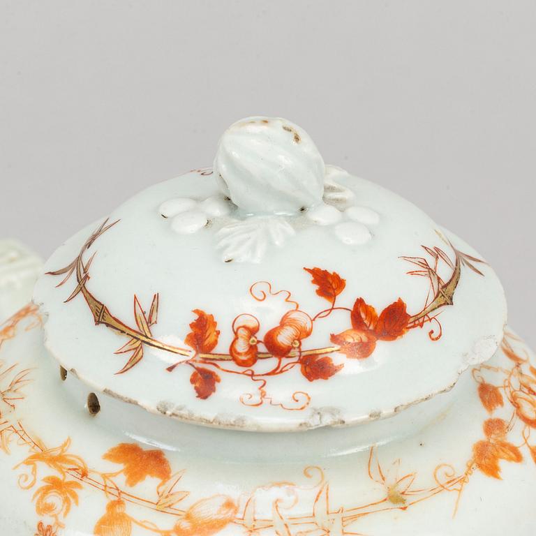 Nine orange and white export porcelain service, Qing dynasty, 18th-19th century.