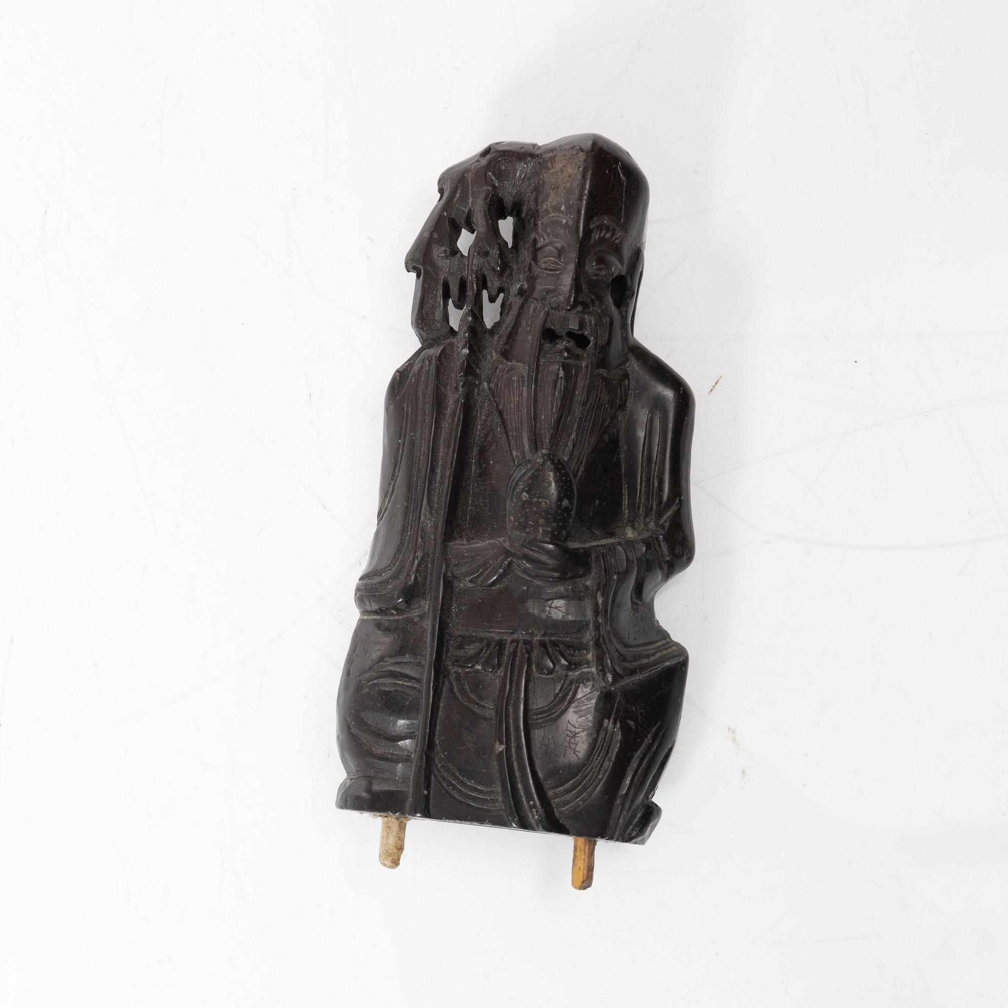 A Chinese green stone brush washer, a carved bone and a soapstone figure, partly Qing dynasty.