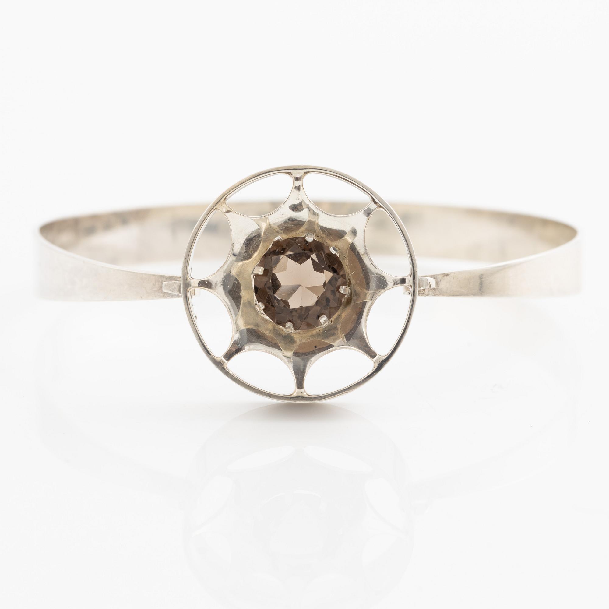 Arm ring and brooch, silver with smoky quartz, Kultasepät Salovaara.