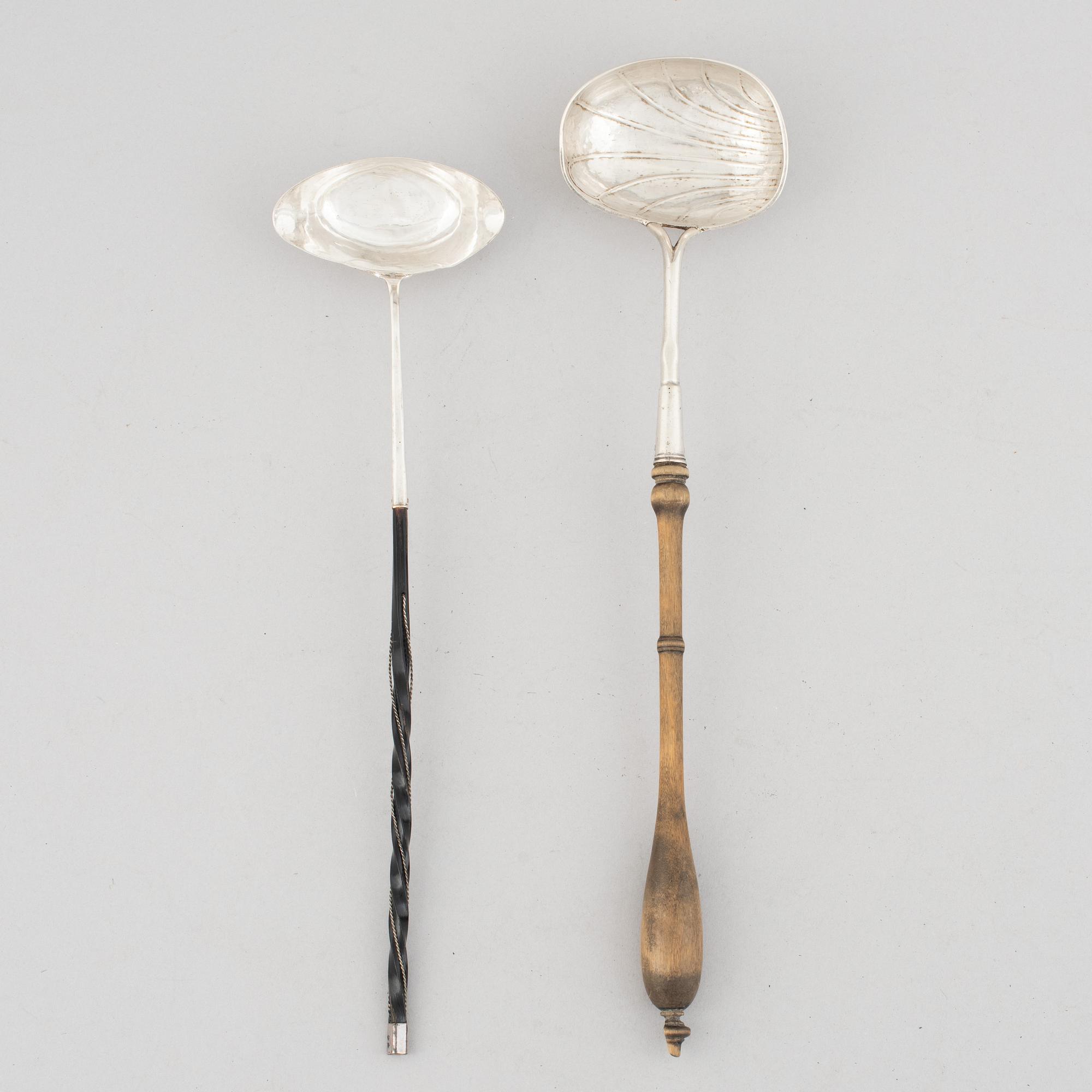 Two Swedish silver soup ladles, late 18th-early 19th Century.