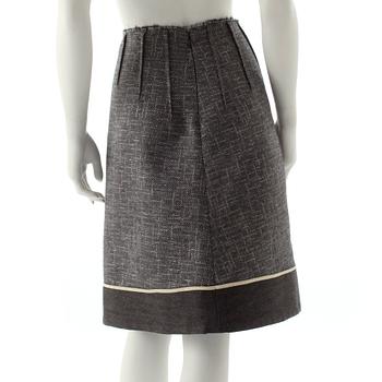 MARNI, a grey wool blend skirt with silver treads.