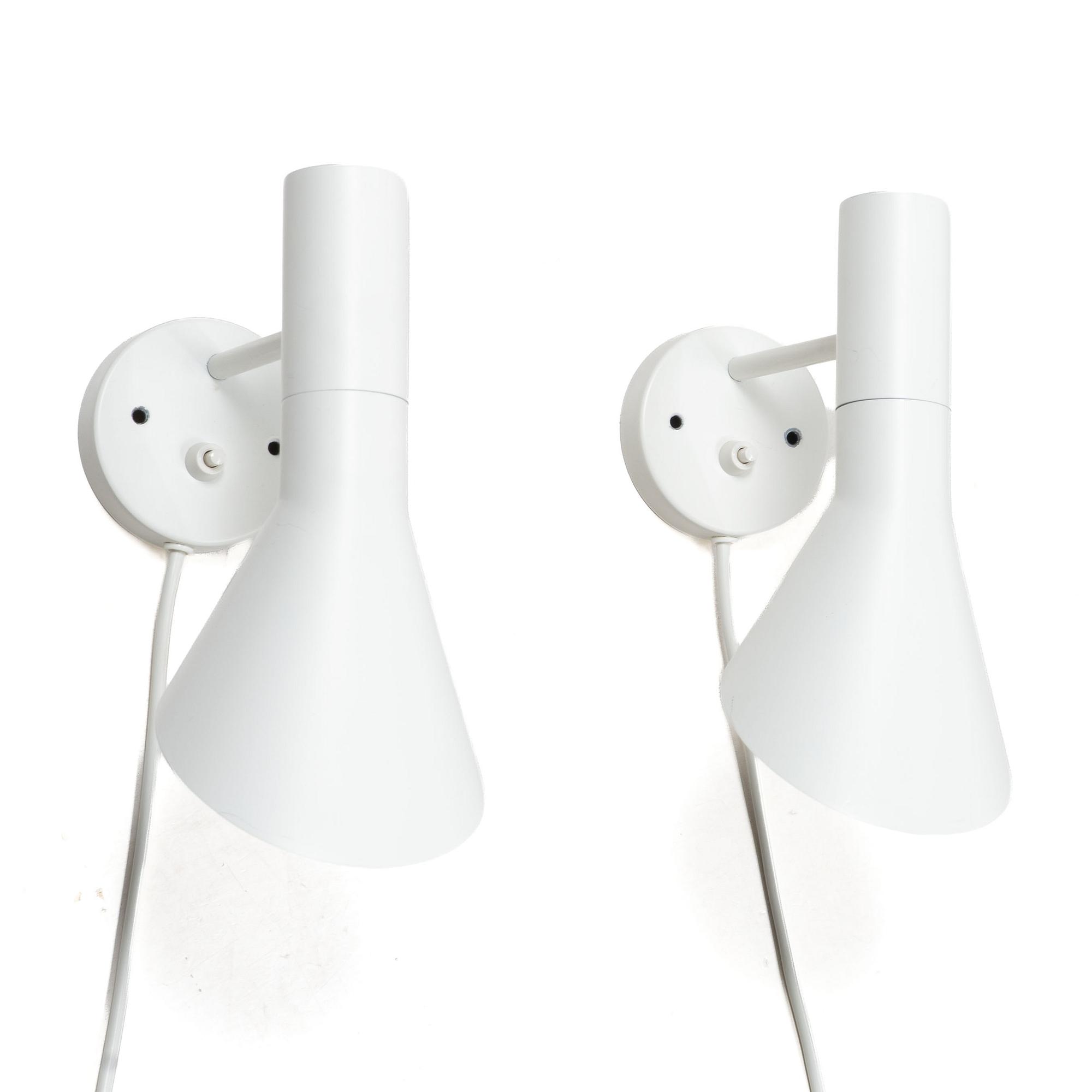 Arne Jacobsen, Wall lights/bedside lights, a pair, “AJ”, Louis Poulsen, Denmark.
