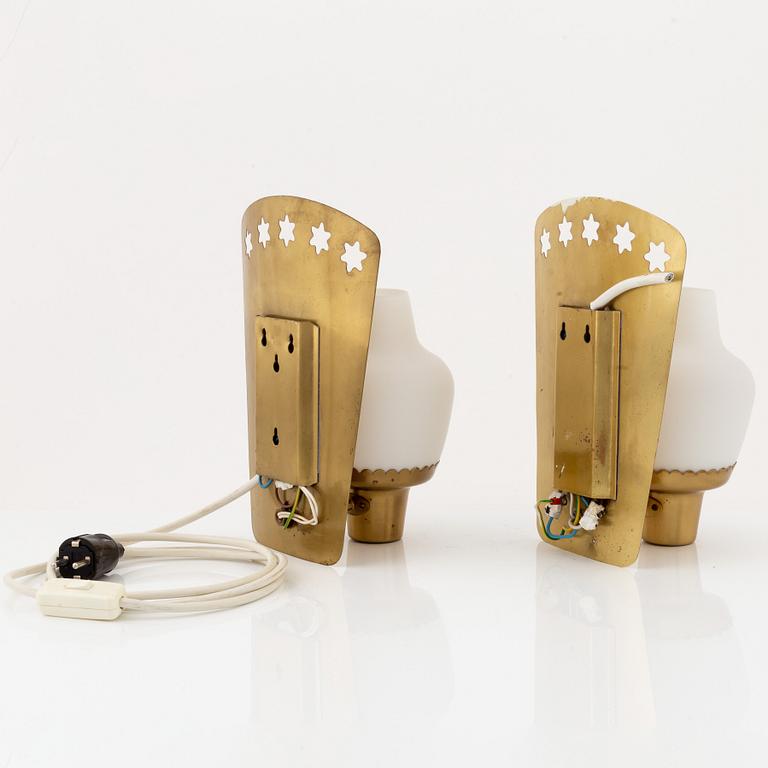 Hans Bergström, a pair of model '406' brass and glass wall lights, Ateljé Lyktan, mid 20th Century.