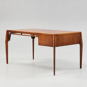 A Carl-Axel Acking Swedish Modern mahogany desk, Nordiska Kompaniet, 1950's.