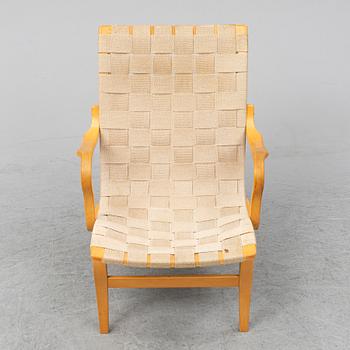 A beech Bruno Mathsson 'Eva' armchair from Dux.